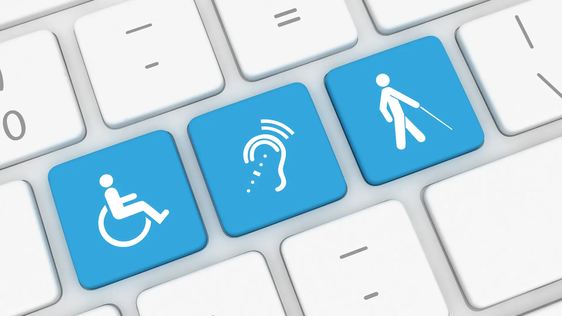 A keyboard is shown with a wheelchair symbol, an ear with hearing aids and a person with a white can. All are surrounded by other keyboard keys.