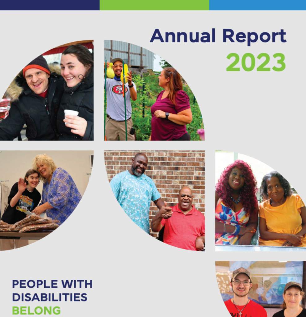 Cover of a 2023 Annual Report on a light gray background with a dark navy blue and green stripe across the top. The title "Annual Report" appears in bold dark navy blue text in the upper right, with "2023" displayed beneath it in large bold green text. In the lower left corner, bold text reads "PEOPLE WITH DISABILITIES" in dark navy blue, followed by "BELONG" in green. The cover features six photos of diverse people arranged in rounded, circular-cropped shapes: Upper left: A smiling man wearing a black puffer jacket and an orange knit hat stands close to a young woman with dark hair and black earrings. She is also smiling and holding a small white paper cup. They appear to be outdoors at a winter event. Upper center: A young black man in a gray San Francisco 49ers t-shirt and khaki pants holds up a bright yellow object (possibly a garden tool or birdfeeder) and laughs. Beside him, a woman with reddish-brown hair in a maroon top smiles back at him. They are outdoors surrounded by green plants and a metal fence, suggesting a garden setting. Middle left: Two women stand together indoors near what appears to be a food preparation or bake sale table with bread or pastries. One woman has curly blonde hair and wears a blue floral top; the other, shorter woman has dark hair, wears a black graphic t-shirt, and is waving at the camera with a cheerful expression. Center: Two black men stand in front of a brick wall, both smiling broadly. The taller man wears a light blue short-sleeve shirt; the shorter man wears a red polo shirt and appears to be gesturing with his hands in a celebratory or expressive way. Middle right: Two black women sit close together, both smiling warmly at the camera. The woman on the left has voluminous curly red hair and wears a colorful floral top with a teal necklace. The woman on the right has natural gray hair and wears a yellow top. Lower right (partially cropped): Two people wearing baseball caps smile at the camera in what appears to be an indoor setting. One wears glasses and a red shirt; the other wears a gray top. Only the upper portion of this photo is visible.