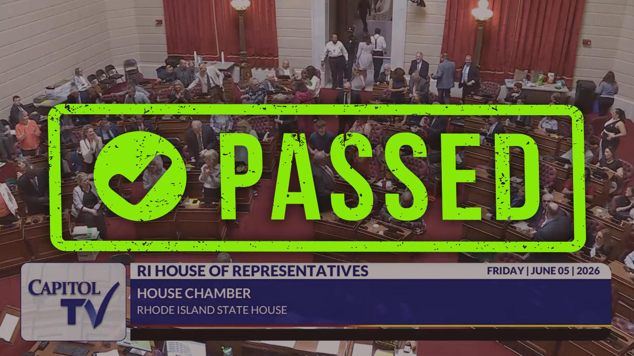 Capitol TV broadcast of the Rhode Island House of Representatives chamber on June 5, 2026, overlaid with a bold green "PASSED" stamp with a checkmark, marking the passage of the FY2027 state budget.